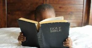 child with Bible